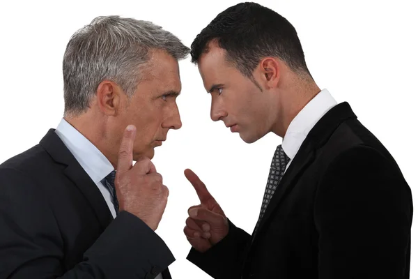 Couple of executives discussing Royalty Free Stock Images