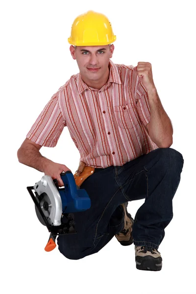 A carpenter making a yes gesture. — Stock Photo, Image