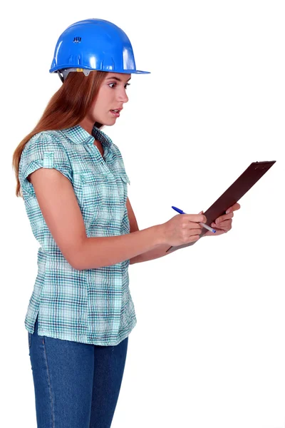 Shocked woman holding clipboard — Stock Photo, Image