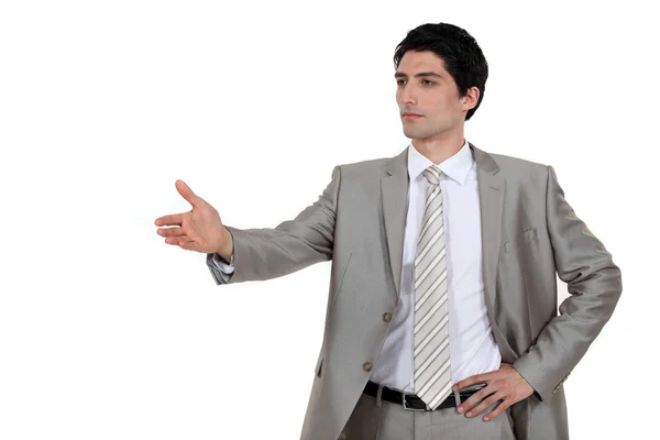 Confident businessman offering to shake hands — Stock Photo, Image