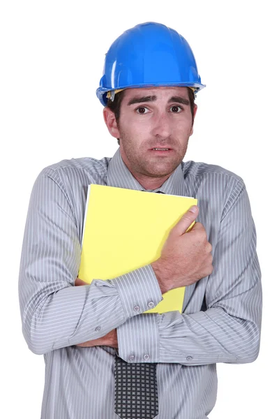 Scared architect holding files — Stock Photo, Image