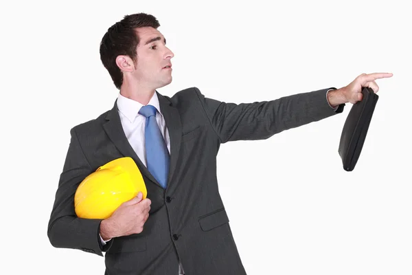 Empresario en traje gesticulando sobre fondo blanco — Foto de Stock