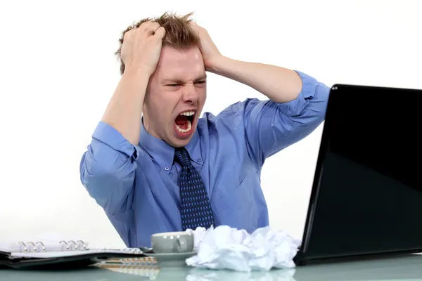 Frustrated man pulling his hair out — Stock Photo, Image