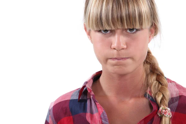 Chica tirando de una cara — Foto de Stock