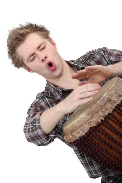 Oblique image of boy playing drum — Stock Photo, Image