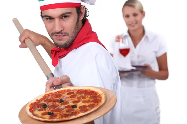 Pizzeria arbetstagare — Stockfoto