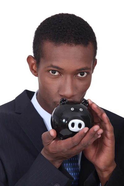 Portrait of a man with money box — Stock Photo, Image