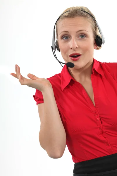 Chirpy blond call-center worker — Stock Photo, Image