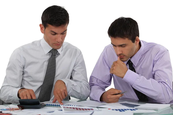 Businessmen with a calculator — Stock Photo, Image