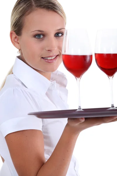 Waitress with tray and glasses Stock Picture