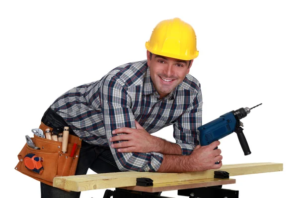 Carpenter posing with power drill — Stock Photo, Image