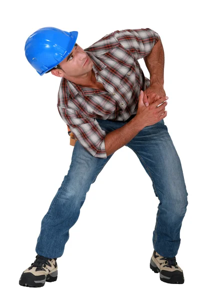 Builder with muscular pain — Stock Photo, Image