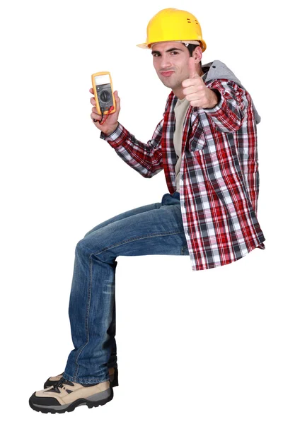 Electrician happy with electrical reading — Stock Photo, Image