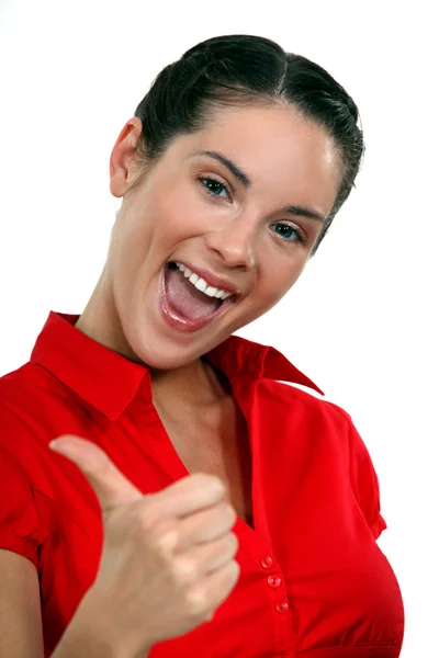 Peppy woman giving the thumb — Stock Photo, Image