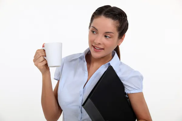 Businesswoman with a hot drink — Stock Photo, Image