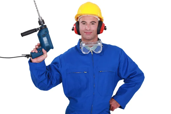 Confident handyman holding power drill — Stock Photo, Image