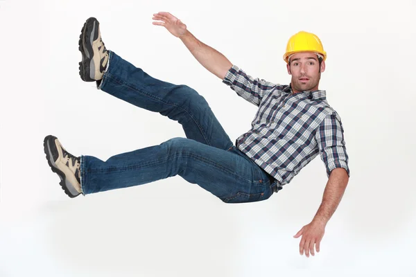 A construction worker in freefall. — Zdjęcie stockowe