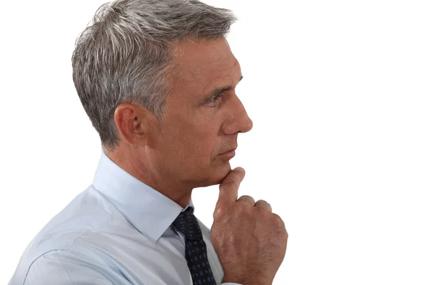 Senior businessman deep in thought — Stock Photo, Image