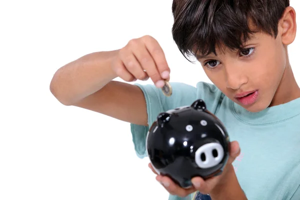 Boy and money box — Stock Photo, Image