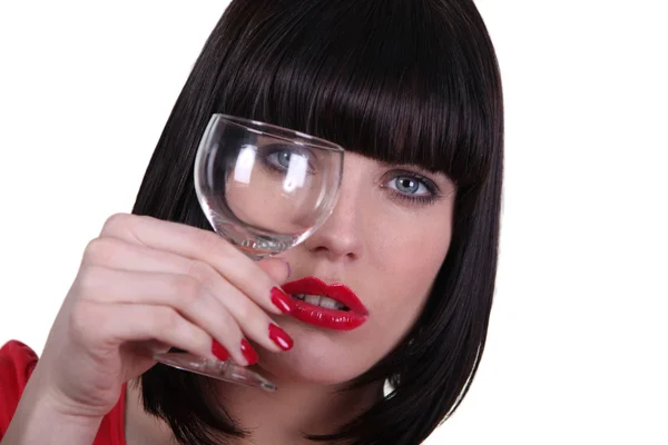 Woman holding empty glass — Stock Photo, Image