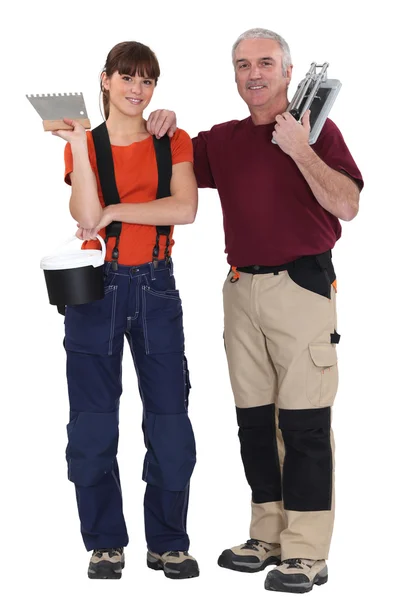 A tiler and his apprentice. — Stock Photo, Image