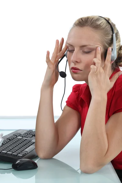 A businesswoman having a headache. — Stock Photo, Image