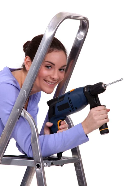 Woman with drill — Stock Photo, Image