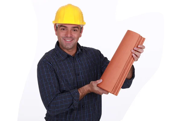 Roofer holding tiles — Stock Photo, Image