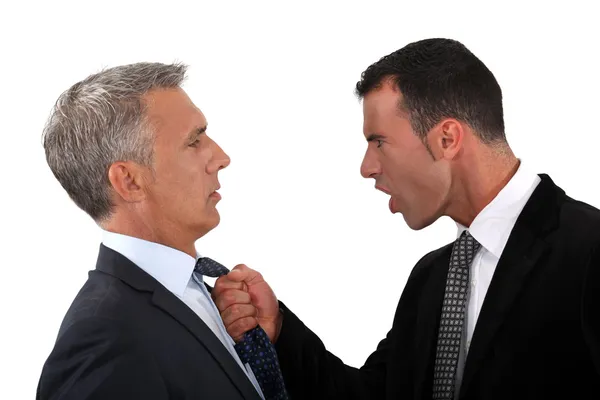 Businessmen fighting Stock Picture