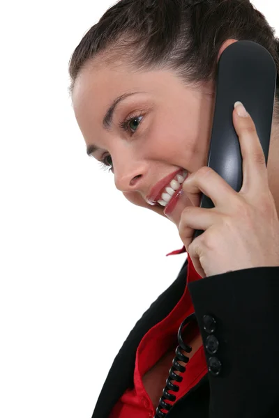 En affärskvinna via telefon. — Stockfoto