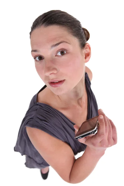 Brunette offering mobile telephone — Stock Photo, Image