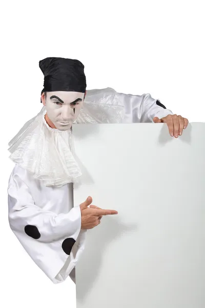 Muž, oblečený jako klaun s nástěnku — Stock fotografie