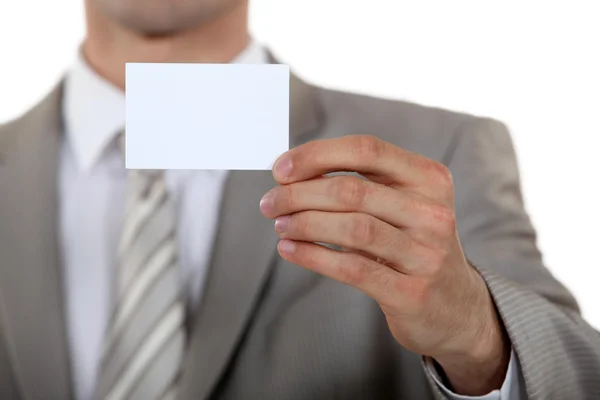 Man holding a business card — Stock Photo, Image