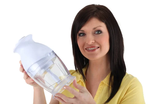 Vrouw met een mini blender — Stockfoto