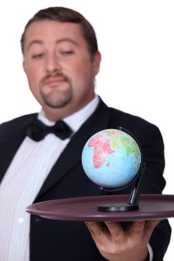 Concept shot showing the world on a platter clipart