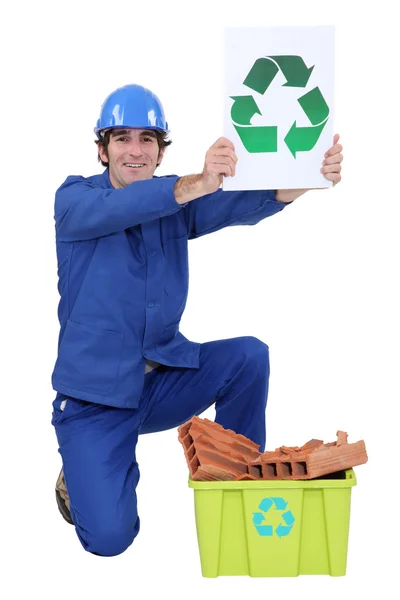 Manual worker encouraging to recycle — Stock Photo, Image