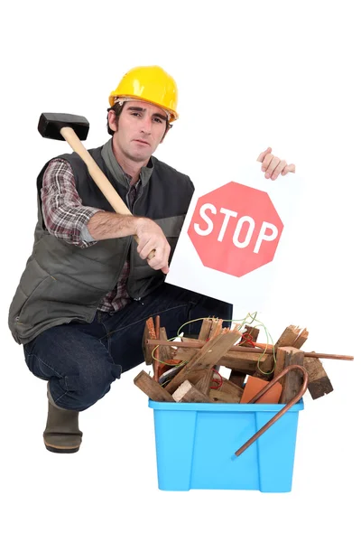 Foreman visar stoppskylt — Stockfoto