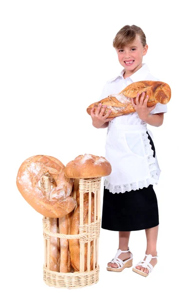 Little girl pretending to be baker — Stock Photo, Image