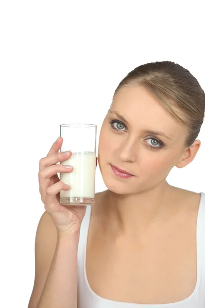 Blonde woman drinking milk — Stock Photo, Image