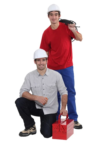 Klempner und Elektriker arbeiten im Team — Stockfoto