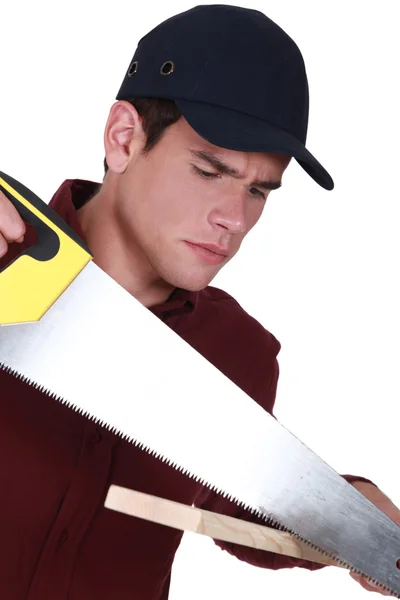 Man with a handsaw — Stock Photo, Image