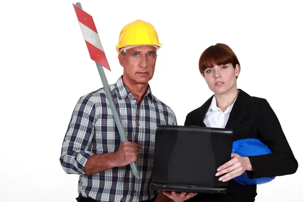 Female architect with construction worker — Stock Photo, Image