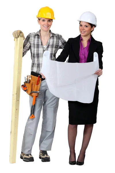 Mujer carpintero y mujer de negocios —  Fotos de Stock