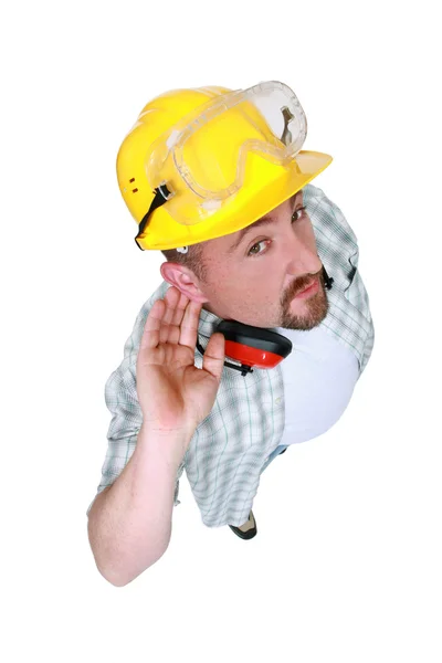 Bauarbeiter hören zu — Stockfoto