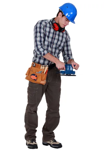 Man using sander — Stock Image Man using sander Royalty Free Stock Images
