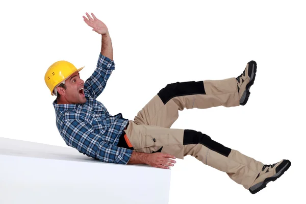 Construction worker falling over — Stock Photo, Image