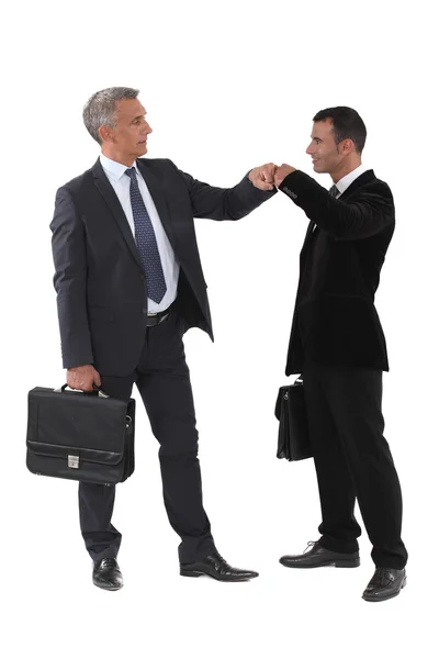 Two businessmen bumping fists — Stock Photo, Image