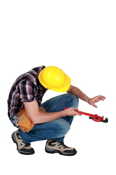 Plumber working on invisible pipe — Stock Photo, Image