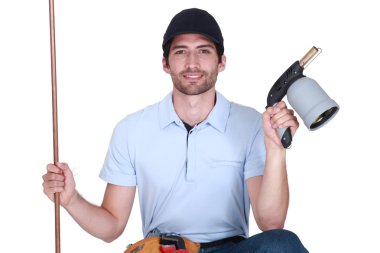 Craftsman holding a welding torch clipart