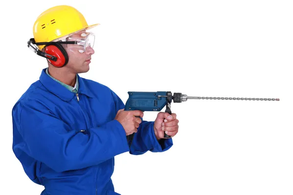 Worker with drill — Stock Photo, Image